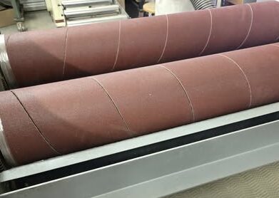 Tim's Woodmaster Drum Sander is 38" wide with twin drums. 